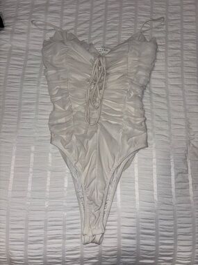 american threads ruffle body suit